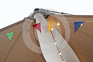 Close-up of colored flags on the ceiling