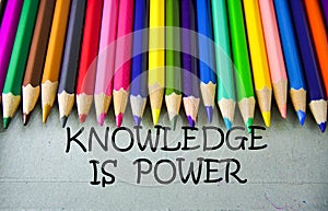 Close up colored pencil writing with KNOWLEDGE IS POWER .Education concept