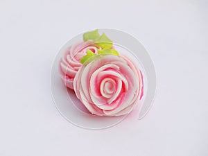 Close up of colorful candy with rose shaped. `A-lua or Allure` Thai handmade candy