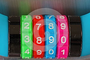 Close up of a colorful combination lock and their numbers