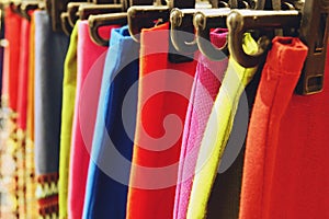 Close up Colorful dress clothing on hanger rack