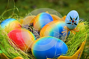 Close up from colorful Easter eggs in a bowl