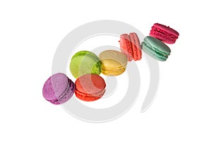 Close up. Colorful french macarons isolated on white background. Copy space