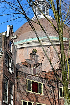 Close-up on colorful heritage buildings with gable rooftops, located on Kattengat street in Amsterdam, Netherlands