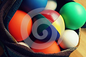 Close up of colorful juggling balls in a bag