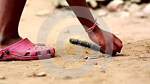 Close up of a colorful marbles and playing child