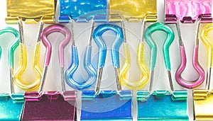 Close up of Colorful Metallic Binder Clips