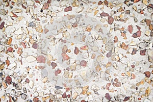 Colorful multicolored small gravel floor nature patterns texture for background , browm white and red photo