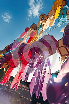 Close up of colorful paper lantern at buddist temple at sunset