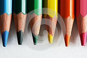 Close-up of colorful pencils isolated on white photo