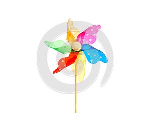Close up colorful pinwheel over white background