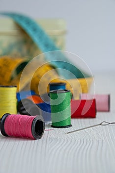 Close-up of colorful sewing objects.