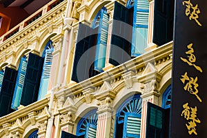 Close-up of Colorful Shutters and Caligraphy Sign in Chinatown, Singapore