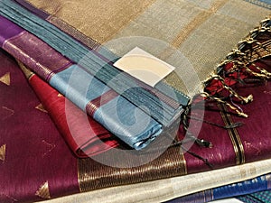 Close up of Colorful traditional Sari, saree displayed in India. natural silk, cotton fold fabric texture. Indian Handloom cotton