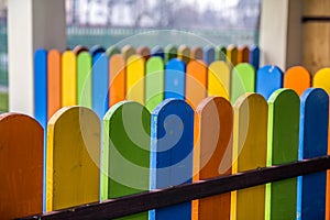 Close-up of colorful wooden planks on fence
