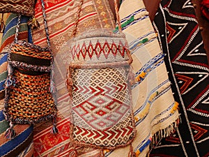 Close up of colourful, handmade Moroccan bags in traditional patterns