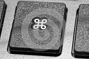 Close-up of the Command key on a Mac keyboard
