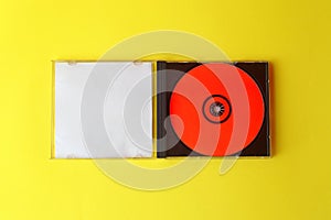Close-Up Of Compact Discs Over White Background