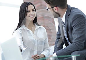 Close-up of company employees communicating in the office