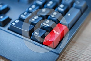Computer keyboard with red button. selected focus on enter button.