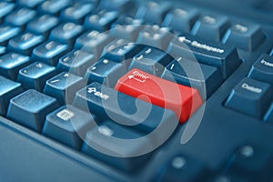 Computer keyboard with red button. selected focus on enter button.