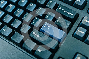 Computer keyboard. selected focus on enter button.