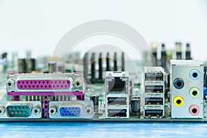 Close up of computer motherboard, back view of connectors