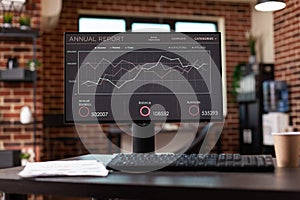 Close up of computer showing company growth analysis in office