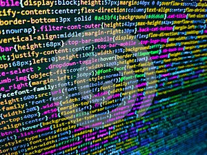 Close up of computer web page code inside of html file. Big data concepts working in cyberspace environment. Programming Coding