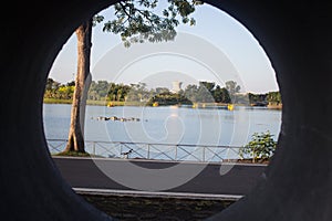 Close up of concrete pipe and view background