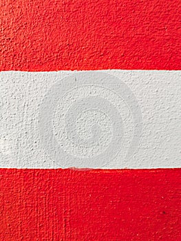 Close up concrete wall on white and red colour