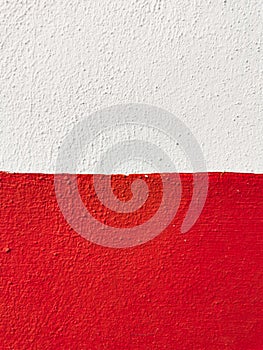 Close up concrete wall on white and red colour