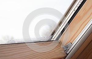 Close up of condensation on velux window in a house, water drops and hight humidity