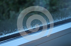 Close up of condensation on the window in a house, water drops and hight humidity