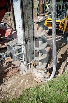 Close up of construction auger, industrial drilling rig