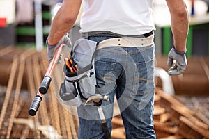 close up construction worker building house foundation