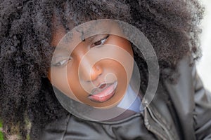 Close-Up of Contemplative Black Woman with Natural Hair