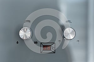 Close-up of control panel of gas fired boiler.