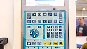 Close up control panel of injection molding machine.