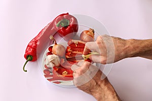 Close-up. Cook hands cutting up a salad