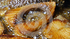 close up of cooking ilsha fish in a cooping pan