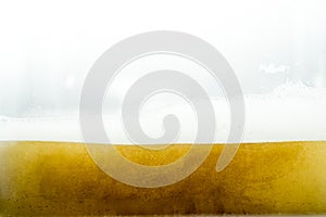 Close up of cool lager beer splash isolated on white background with realistic bubbles