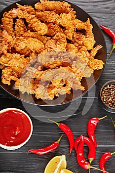 Close-up of corn flakes breaded deep-fried shrimps