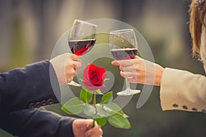 Close up of a couple drinking wine on valentines day