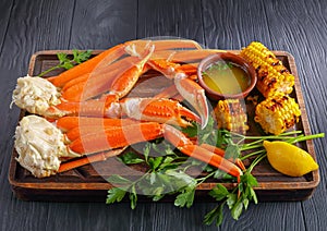 Close-up of Crab legs and corn in cobs