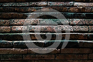 Close-up of Cracked concrete vintage red brick wall background