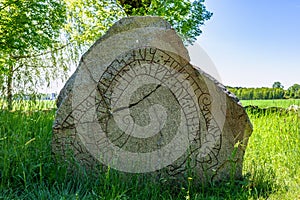 Close up of a cracked rune stone in Sweden