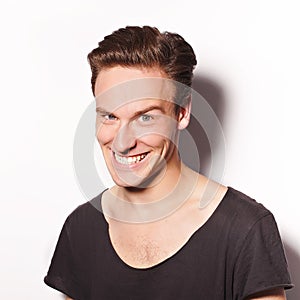 Close up of a crafty young man on white background