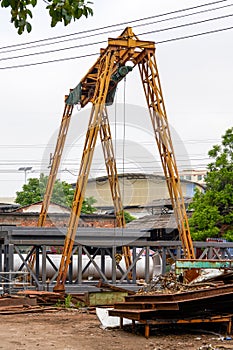 Close-up of crane equipment gantry tower crane in an industrial park