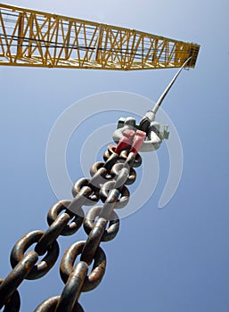 Close up of a crane hook lifting